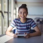 Happy girl secured tablet financing in Mexico through Datacultr